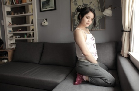 Dark haired teen Yhivi exposing hairy vagina and butthole in socks