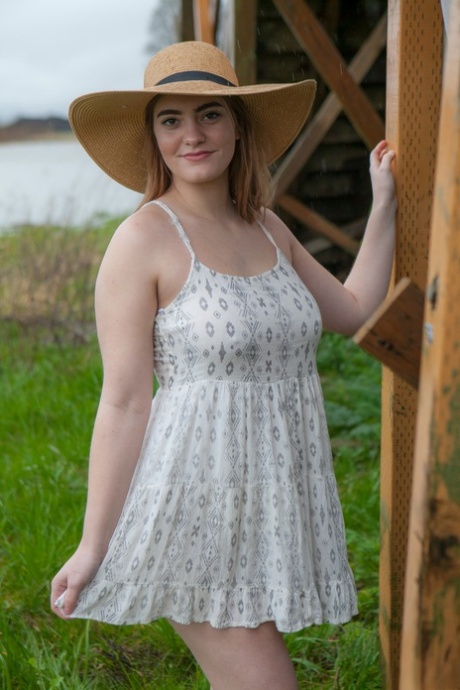 Country girl lifts her dress for naked upskirt showing bald twat and ass