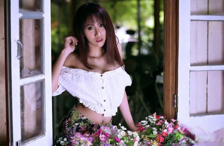 Sweet Thai girl Amy Berry gets totally naked during a solo engagement