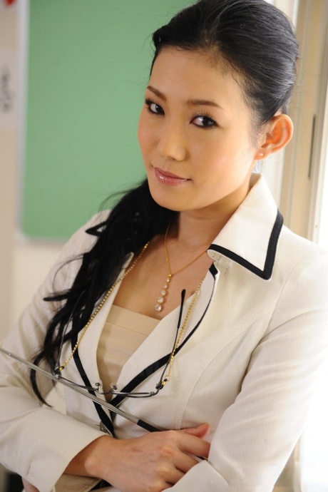 Hot Japanese teacher Yui Komine exposes her panties and bra in classroom
