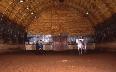 Rich lady sports red lips while getting gangbanged by farm hands in hay loft