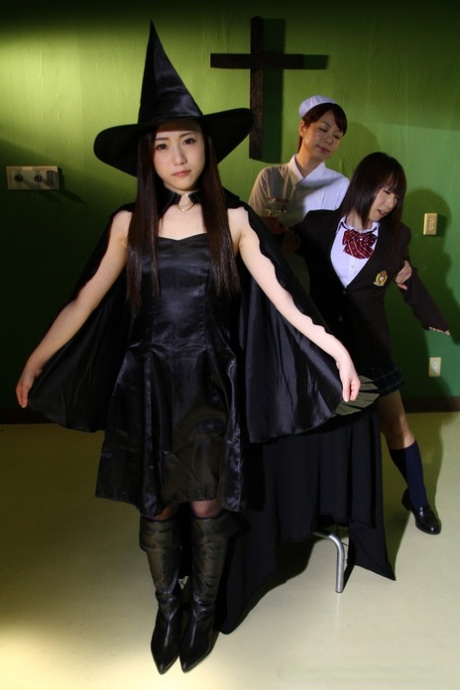 Japanese chicks practice the dark arts while wearing cosplay outfits