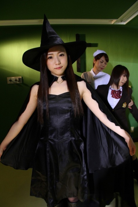 Japanese chicks practice the dark arts while wearing cosplay outfits