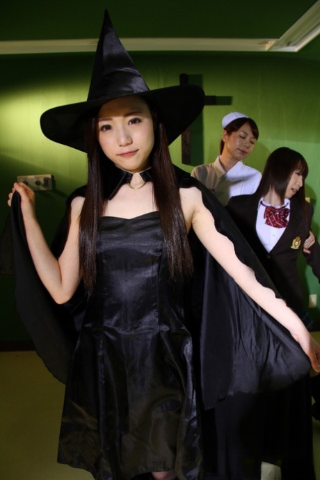 Japanese chicks practice the dark arts while wearing cosplay outfits