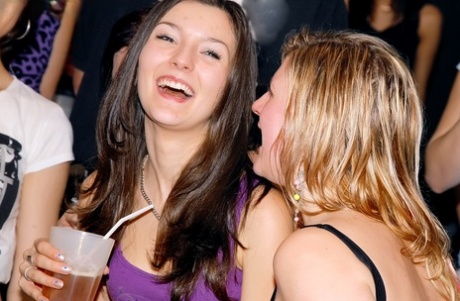 A bunch of chicks on a girl's night out suck and fuck male strippers