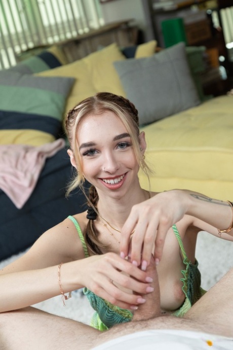 Sexy girl with tattoos takes a selfie before disrobing for POV sex