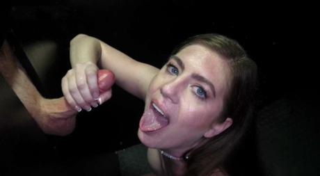 Naked girl Alexis Abbey fills her mouth with sperm while at a gloryhole