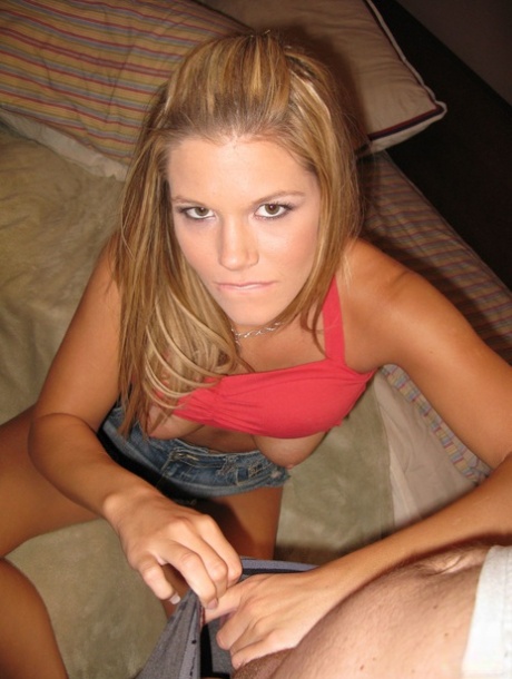 Blonde chick plays with a fairly large cock during POV action