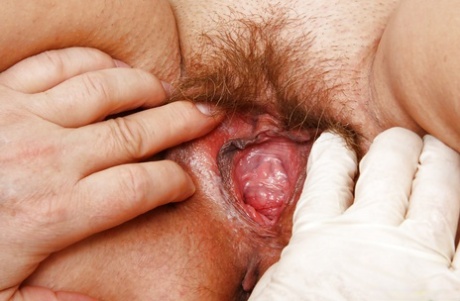 Mature fatty with large saggy tits and hairy cunt penetrated by kinky doc