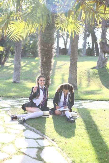 Hot schoolgirls Francesca DiCaprio & Kira Queen pet natural tits under a tree