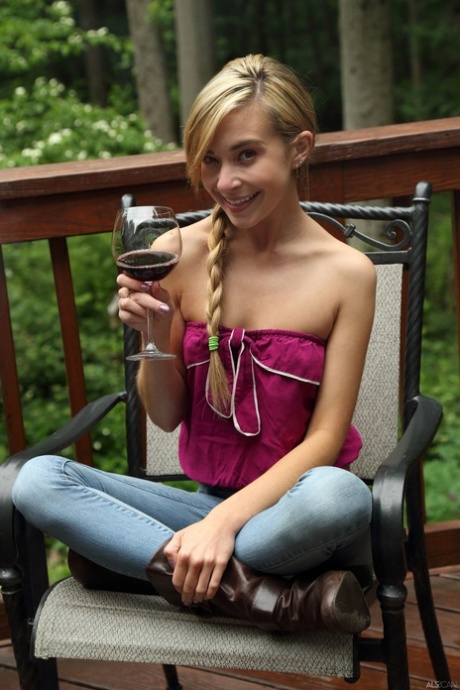 Thin teen Kylie Nicole unveils her tits & plays with a twat stretcher outdoors