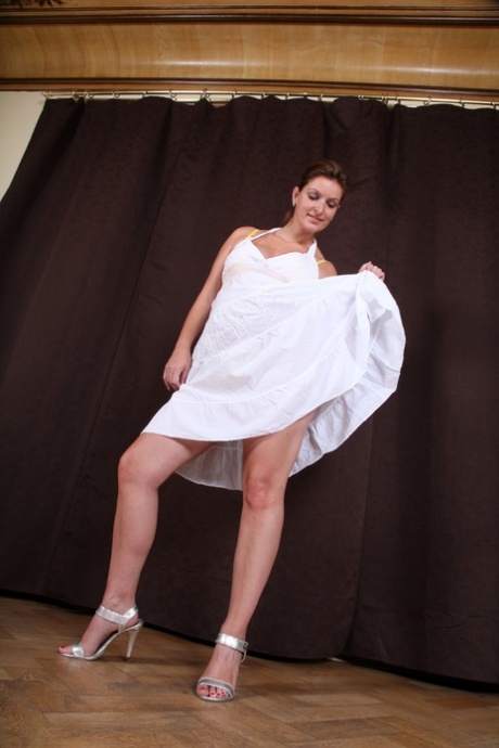 Pregnant beauty Lady Ves strips naked to show her bulging tummy & her big tits