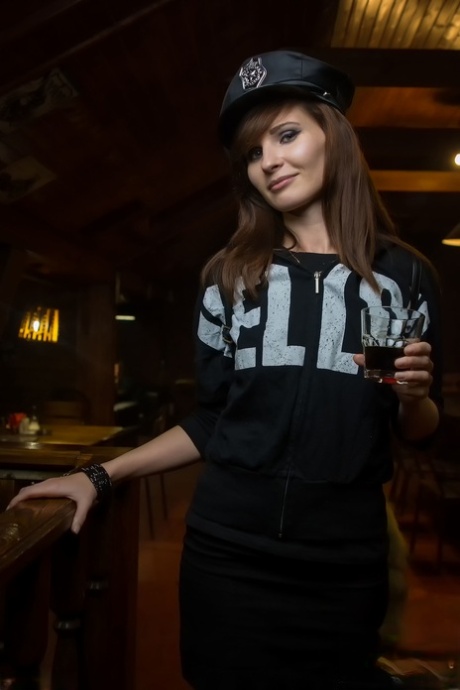 Hot stripper Jeny Smith loses her clothes at the bar & poses in her stockings