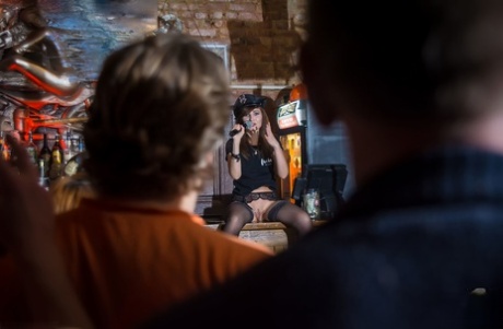 Hot stripper Jeny Smith loses her clothes at the bar & poses in her stockings