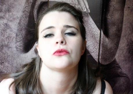 Comely brunette Tiggle Bitties teases with her big boobs in black lingerie