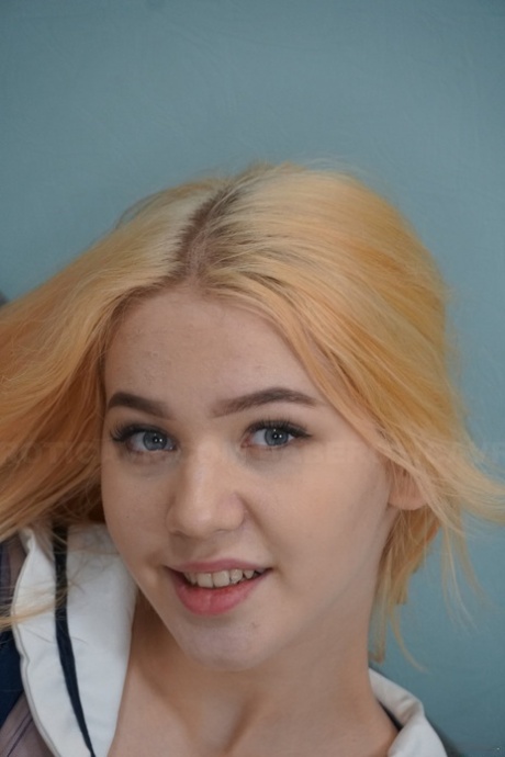 Sweet blonde with blue eyes Dina Soul spreads her legs and toys her twat