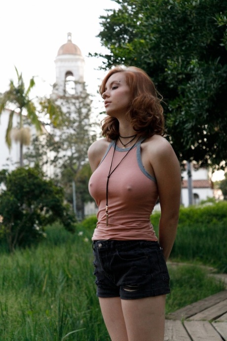 Amateur babe Kayla Coyote unveils her perfect bosom and poses outdoors