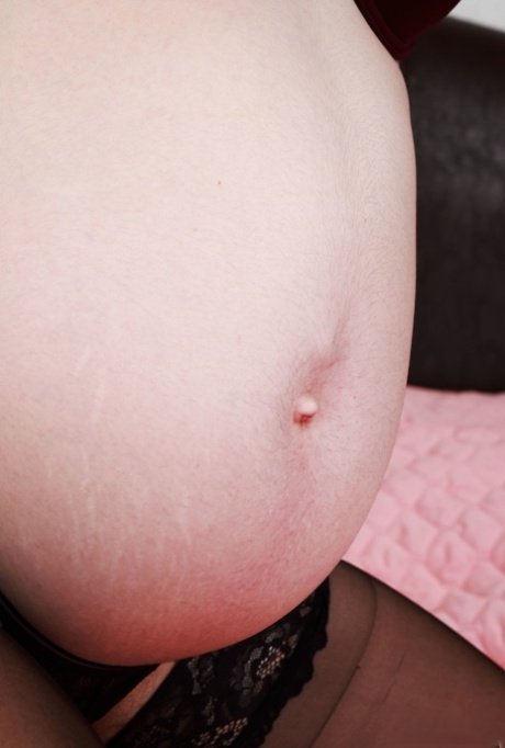 Pregnant amateur Wookie Princess shows off her incredibly hairy pussy up close