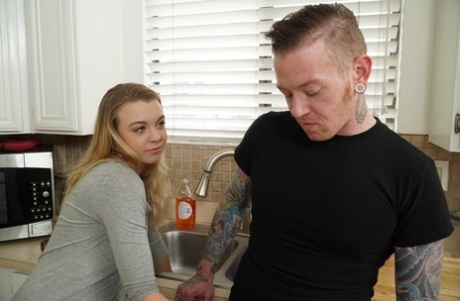 Delightful blonde teen Ashley Manson shows her body and blows her guy's dick
