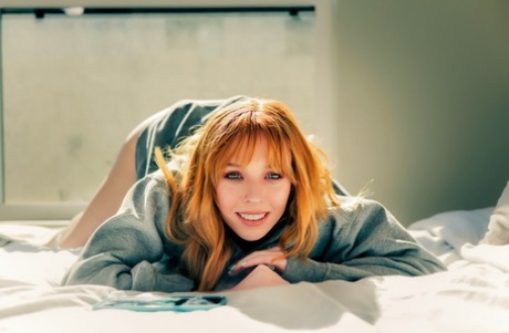 Redheaded teen Madi Collins spreads her twat and takes a stiff boner
