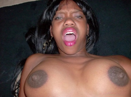 Dirty ebony amateur rubs her juicy tits and black pussy in a compilation